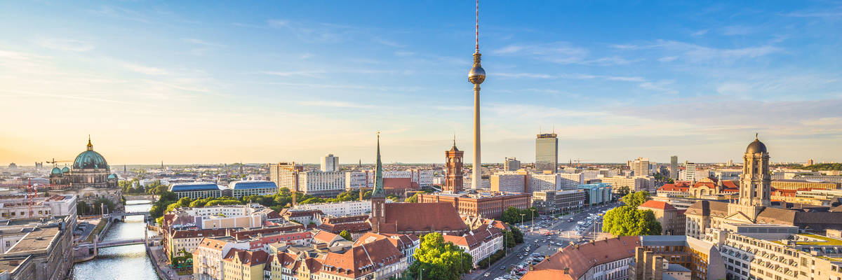 Aerial view of Berlin skyline and Spree river in beautiful evening light at sunset in summer, Germany