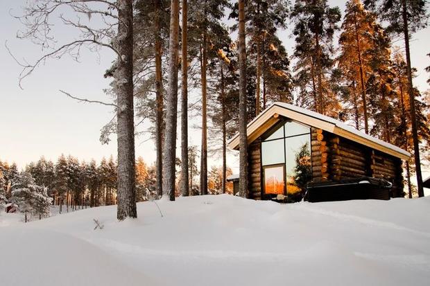 Arctic Retreat cabin in snowy forest in winter, Lulea, Swedish Lapland