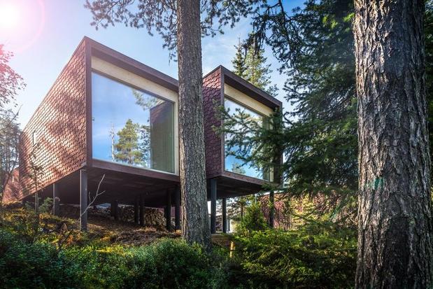 Glass-fronted suite at Arctic TreeHouse Hotel in Finnish Lapland