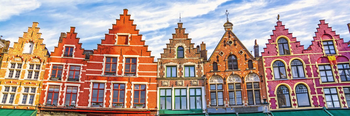 Colorful old brick house on the Grote Markt square in the medieval town of Bruges, Belgium