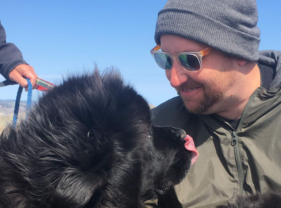 Photo of article author Andy Austen with Newfoundland dog