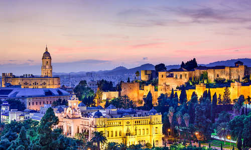Malaga, Spain cityscape of the Cathedral, City Hall and Alcazaba citadel