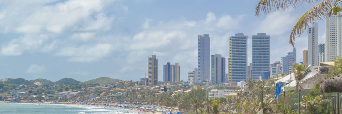 Modern waterfront buildings and paradise beach in Natal, Brazil