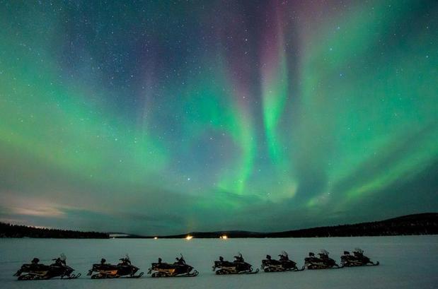 Northern Lights by Snowmobile (Credit- Asaf Kliger © ICEHOTEL) 