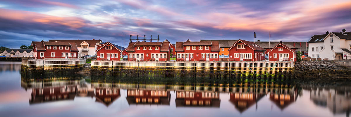 Sunset over harbor houses in Svolvaer