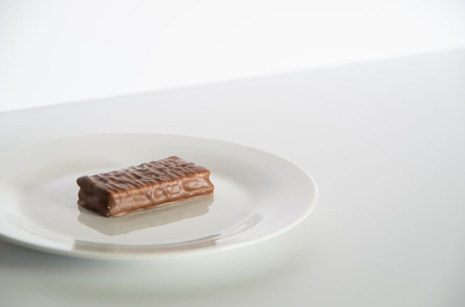 Tim Tam chocolate biscuit on a plate